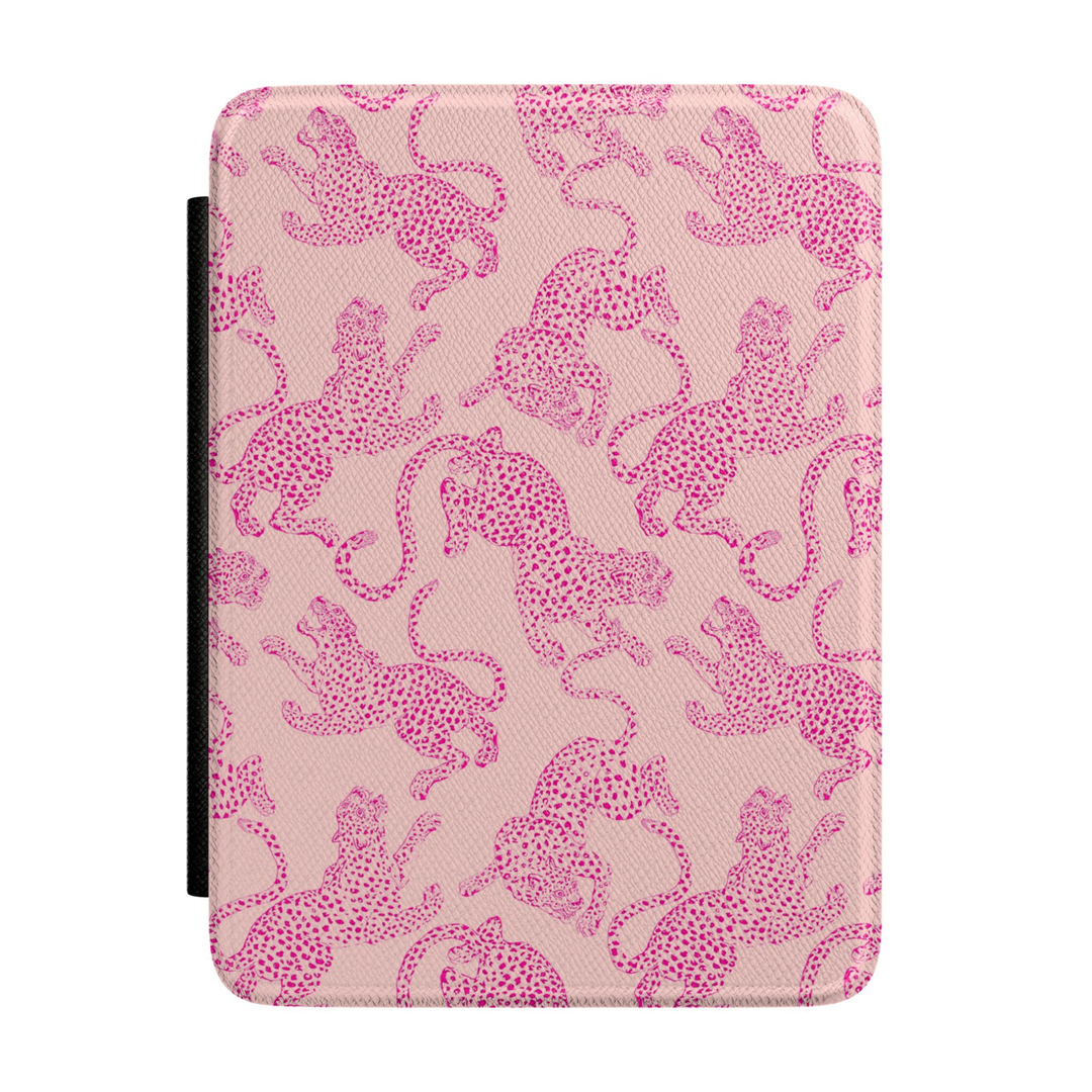 Blush pink Kindle case featuring repeating hot pink cheetah illustrations in a stylish preppy animal print pattern.