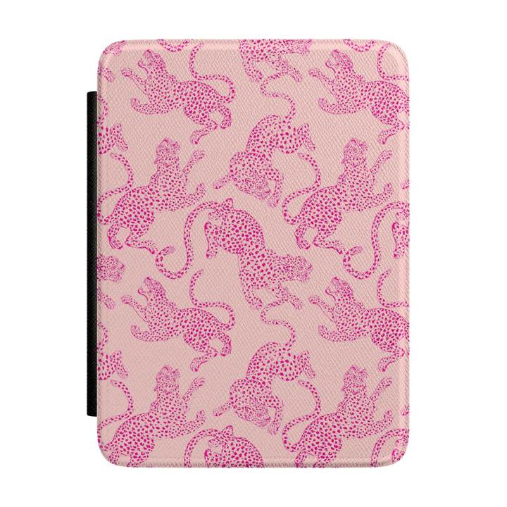 Blush pink Kindle case featuring repeating hot pink cheetah illustrations in a stylish preppy animal print pattern.