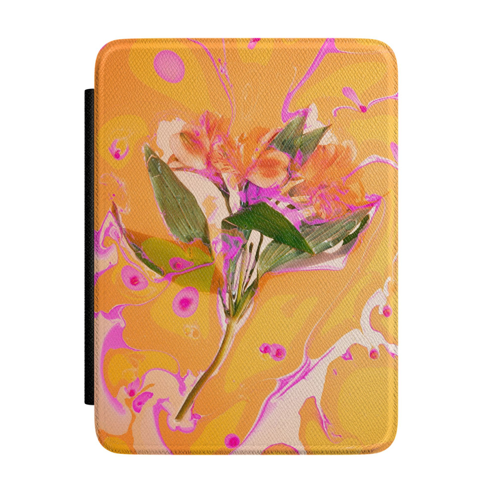 Orange and pink floral Kindle case featuring an abstract botanical flower with green leaves, vibrant magenta accents and a golden marbled background.