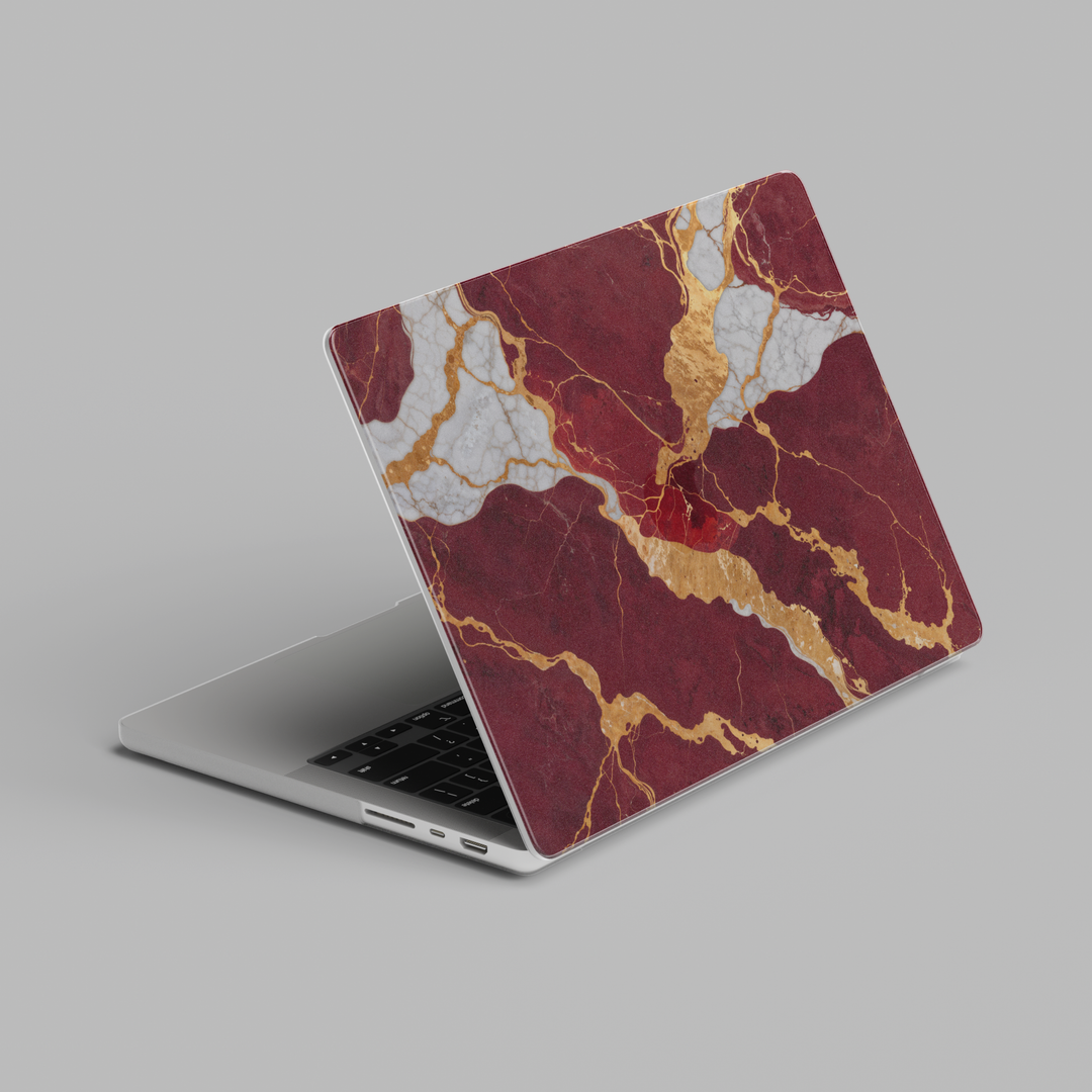 MacBook case with burgundy marble pattern and gold veining in a luxury stone-inspired design