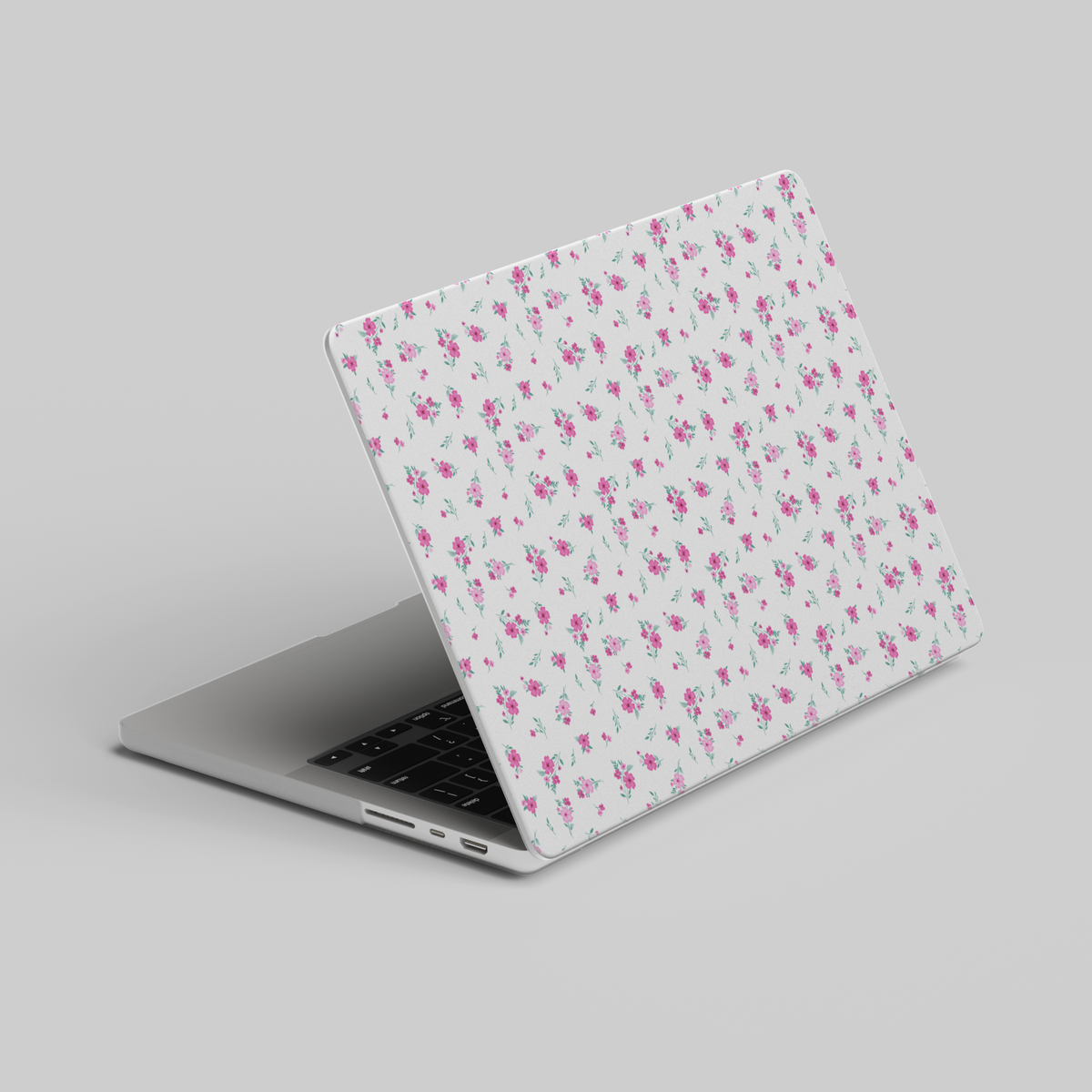 Minimal white MacBook case with tiny pink floral print – aesthetic laptop skin compatible with MacBook Air 13, Pro 14, Pro 16, and more.