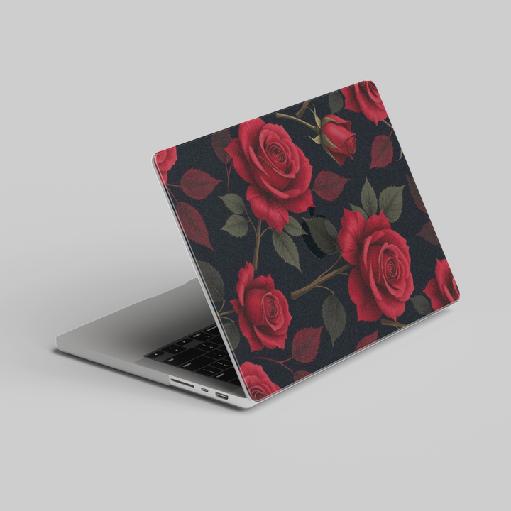 Chic black MacBook case with large red roses and green leaves – floral MacBook Pro and Air skin for 13, 14, 15, and 16 inch models.
