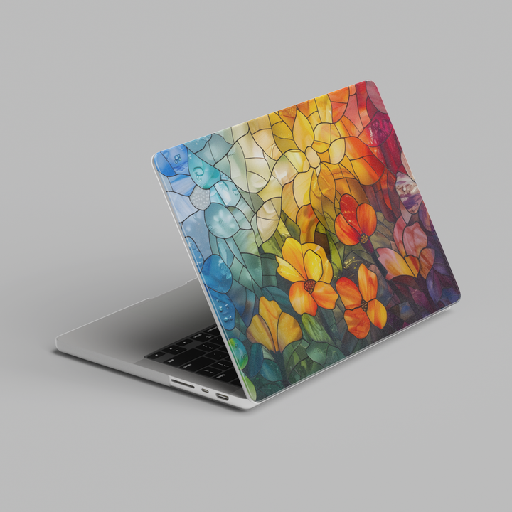 Colorful stained glass floral MacBook case featuring vibrant flowers in blue, yellow, orange, and red tones