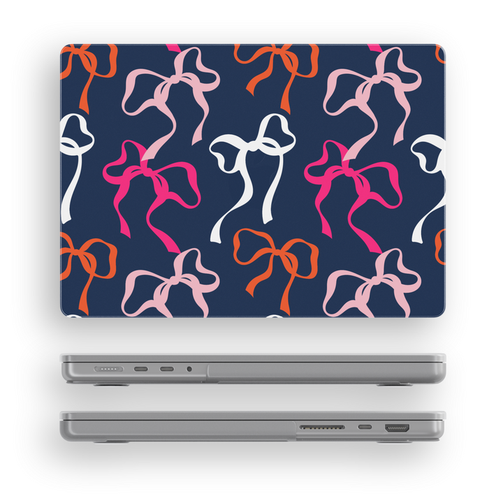 Navy blue MacBook case with bold colorful bows in pink, white, peach and orange – aesthetic girly tech cover for Air and Pro models