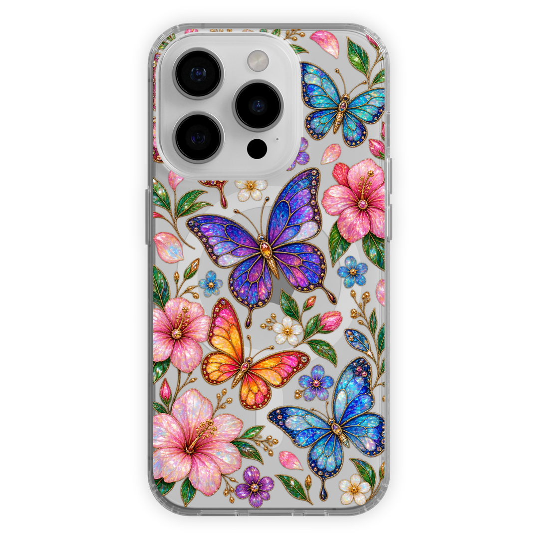 Clear MagSafe iPhone case with jeweled blue, purple, pink and orange butterflies, hibiscus flowers, green leaves and colorful floral details.
