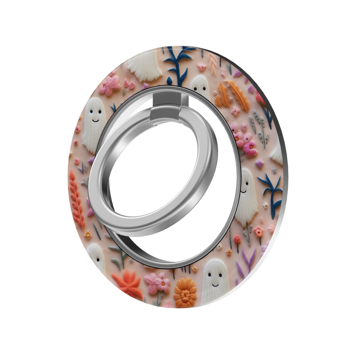 Sweet Little Ghosts MagSafe ring holder with cute white ghosts, pastel pink and orange flowers, botanical details and silver rotating magnetic phone grip.
