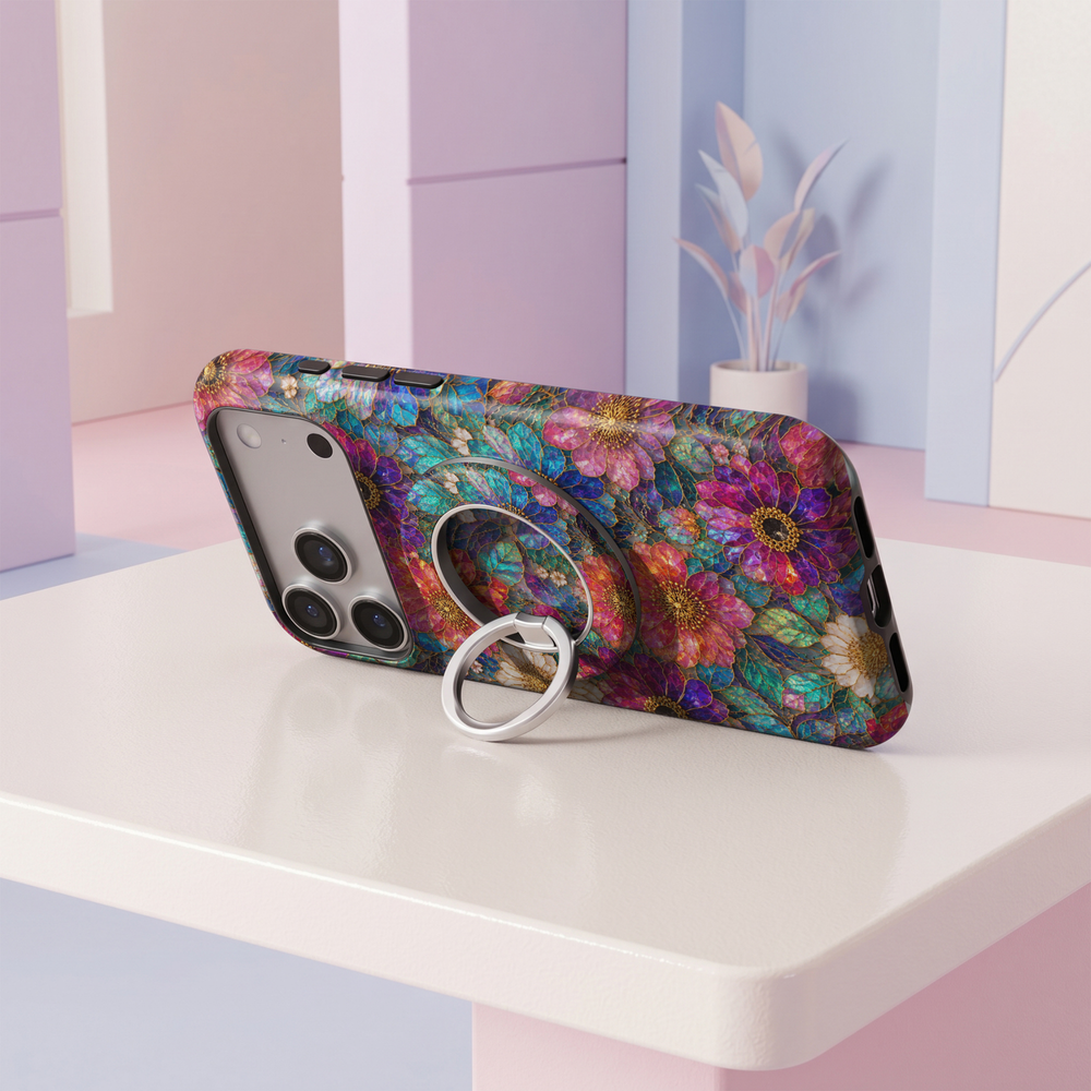 Jewel Bloom MagSafe ring holder with vibrant turquoise, blue, purple and pink stained glass floral design with gold accents and silver rotating magnetic phone grip.
