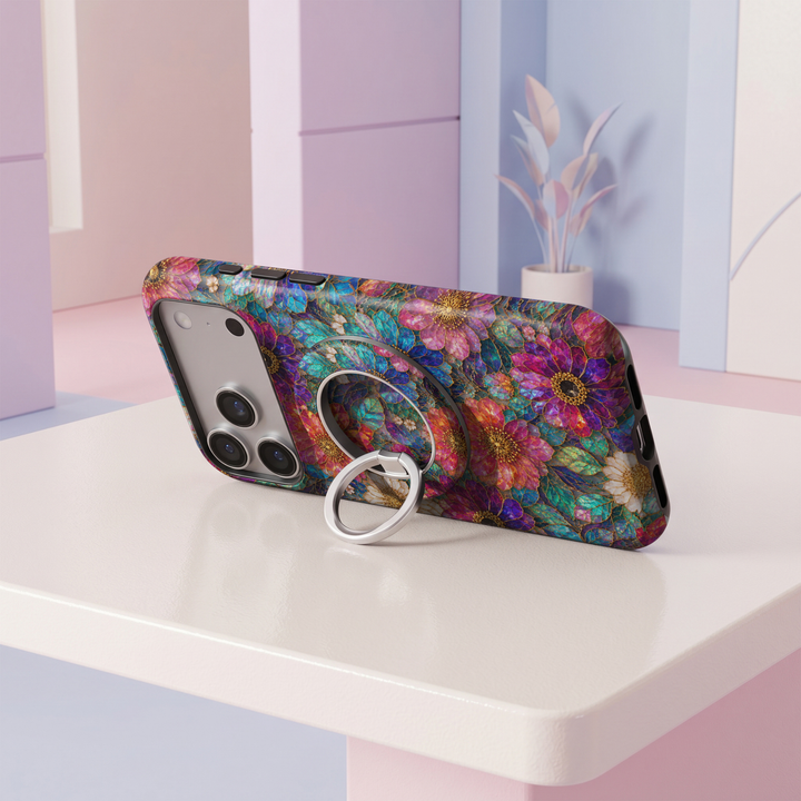 Jewel Bloom MagSafe ring holder with vibrant turquoise, blue, purple and pink stained glass floral design with gold accents and silver rotating magnetic phone grip.