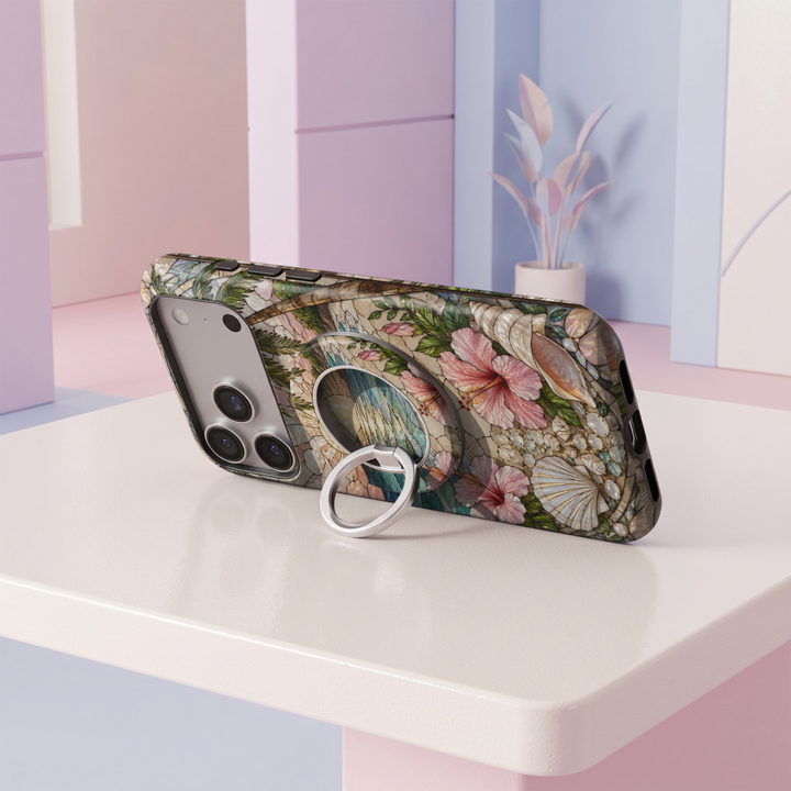Island Paradise MagSafe ring holder with tropical beach sunset, turquoise ocean, palm trees and pink hibiscus flowers with silver rotating magnetic phone grip.