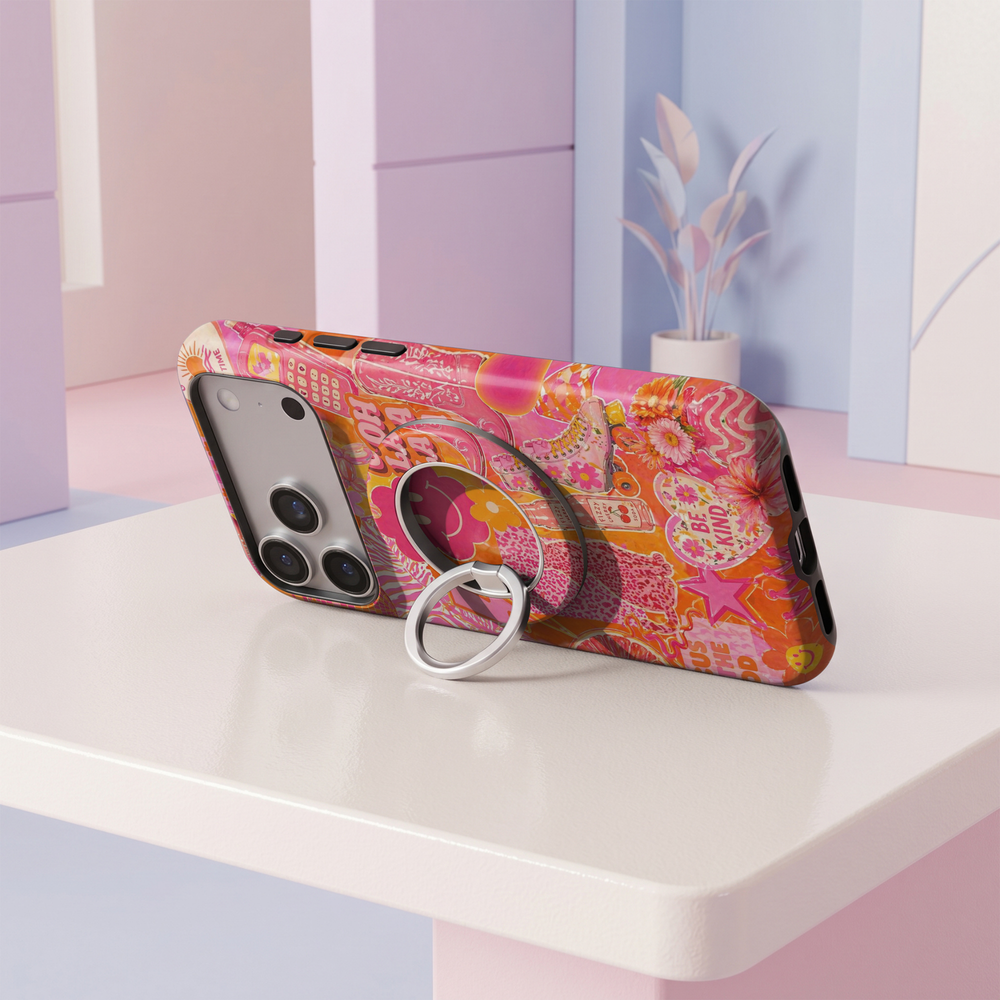 Retro Pink Pop MagSafe ring holder with vibrant pink and orange vintage-inspired printed design and silver rotating magnetic phone grip.