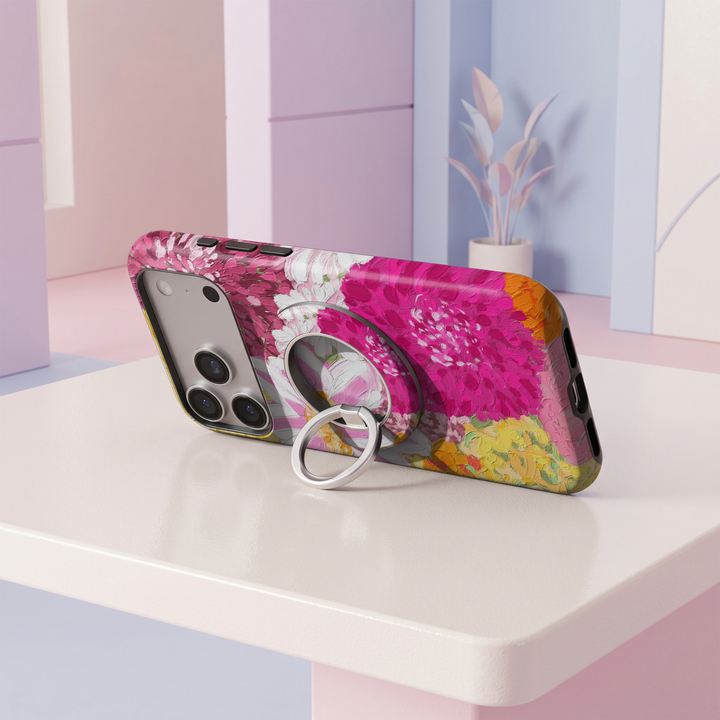 Pink Painted Blooms MagSafe magnetic ring holder with vibrant pink floral artwork and silver rotating phone grip and stand.