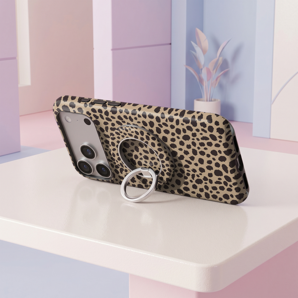 Classic beige and black leopard print MagSafe ring holder with a bold animal pattern and sleek silver magnetic phone grip and stand.