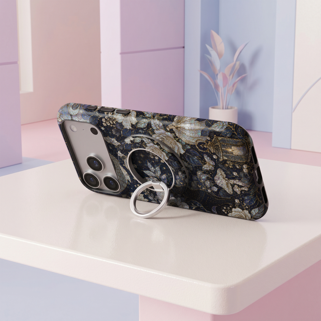Midnight navy floral stained glass MagSafe ring holder with luminous ivory flowers, delicate gold accents and a sleek silver magnetic phone grip and stand.