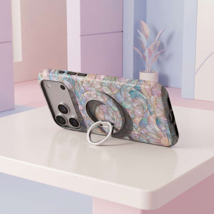 Pastel opal stained glass MagSafe ring holder with iridescent pink, blue and pearl tones and a silver magnetic phone grip and stand.