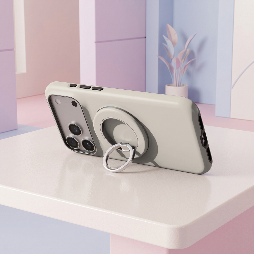 Ivory cream MagSafe ring holder with a clean neutral beige design and sleek silver magnetic phone grip and stand.