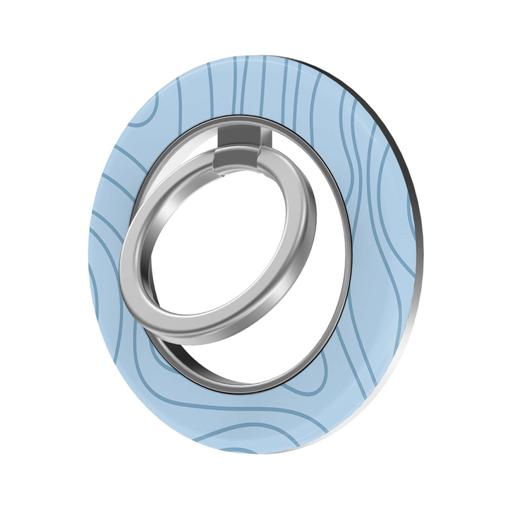 Blue Flow MagSafe Ring Holder featuring soft light blue flowing contour lines with a silver ring, a minimalist pastel magnetic phone grip and stand for MagSafe-compatible iPhone cases.
