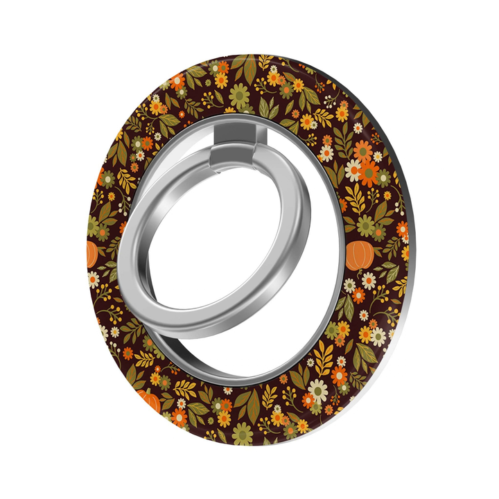 Autumn Heirloom MagSafe Ring Holder featuring tiny orange, mustard, olive and cream fall florals with pumpkins on a dark brown background, a matching magnetic phone grip and stand for MagSafe-compatible iPhone cases.