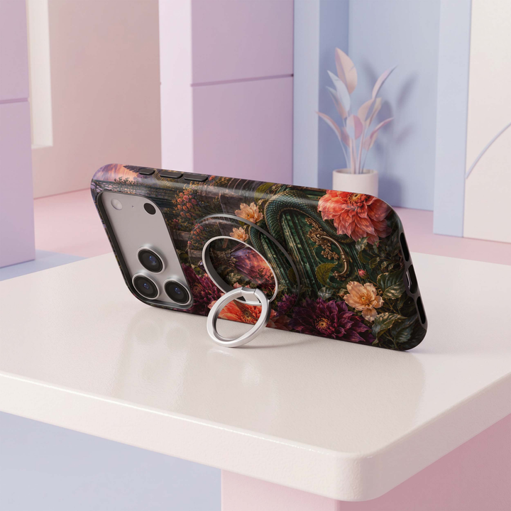 CASELIX Enchanted Garden MagSafe Ring Holder featuring romantic orange and burgundy flowers, dark greenery and a moody garden-inspired design.