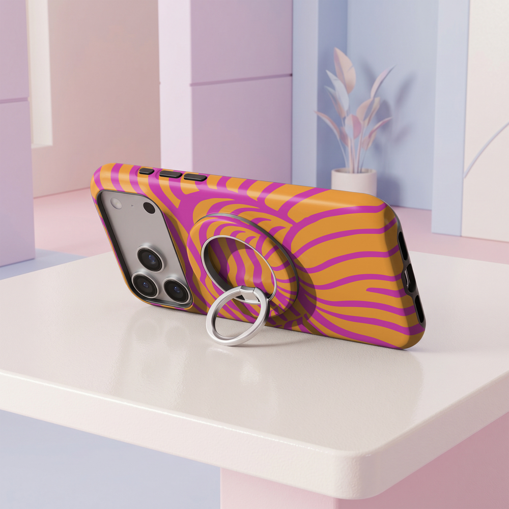 Bright pink and orange wavy abstract pattern MagSafe ring holder with a silver magnetic phone grip and stand.