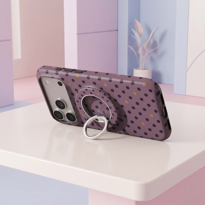 CASELIX Mauve Confetti MagSafe Ring Holder featuring a muted mauve purple background with dark plum and warm caramel polka dots, finished with a silver rotating metal finger ring for a chic phone accessory.