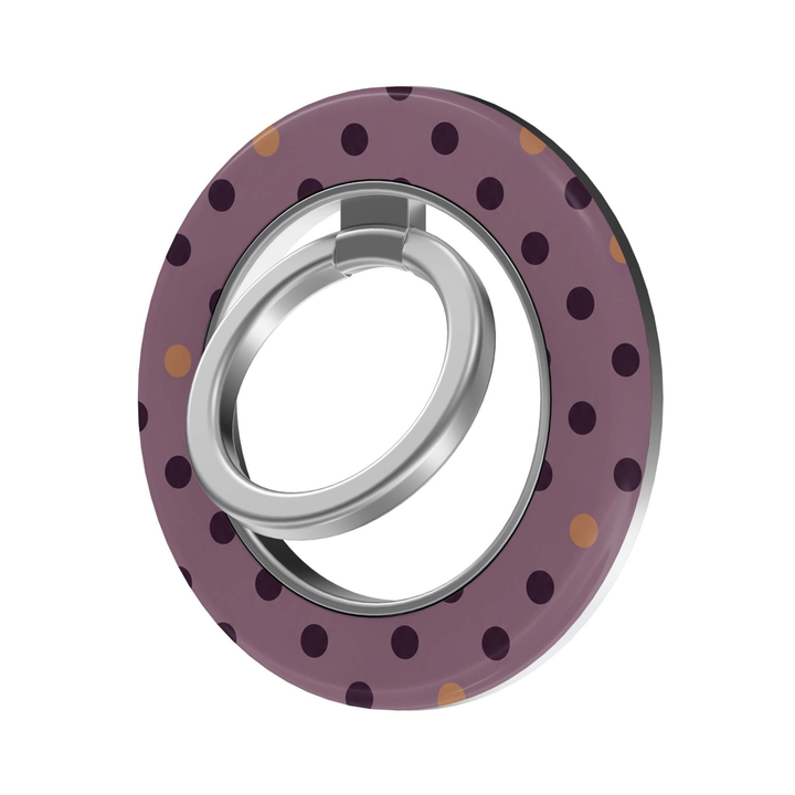 CASELIX Mauve Confetti MagSafe Ring Holder featuring a muted mauve purple background with dark plum and warm caramel polka dots, finished with a silver rotating metal finger ring for a chic phone accessory.