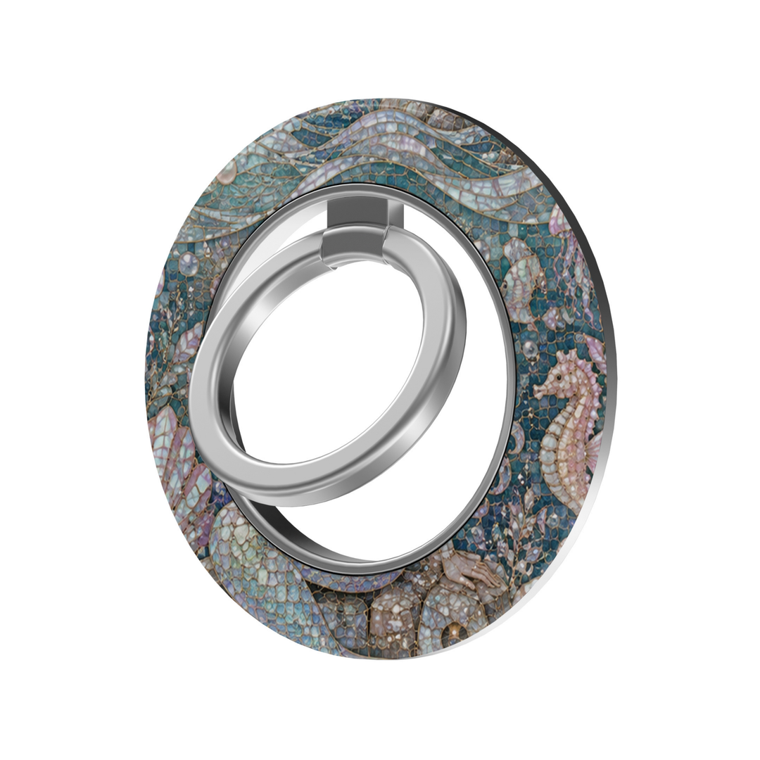 Mermaid Cove MagSafe ring holder featuring an iridescent ocean mosaic with seashells, pearls, seahorses and flowing aqua blue waves with a silver magnetic phone grip.