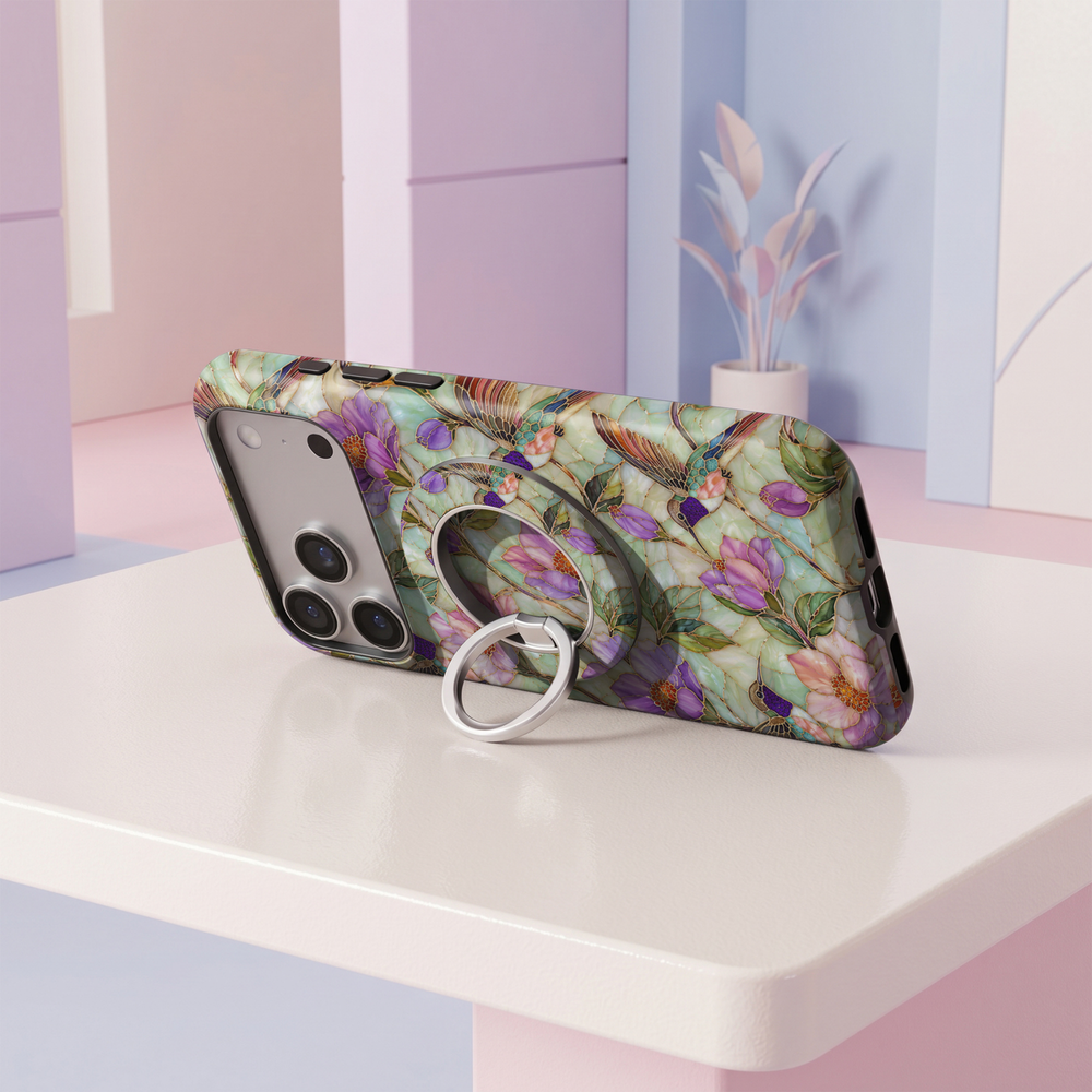 Mint Blossom Mosaic MagSafe ring holder featuring pastel purple and pink flowers, mint green stained glass, botanical leaves and elegant gold accents with a silver magnetic phone grip.