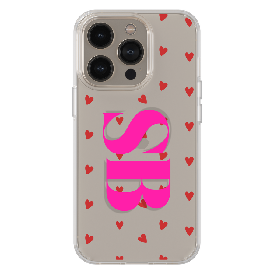Clear iPhone case with red heart pattern and bold hot pink monogram letters. Transparent phone cover for iPhone 15, iPhone 14, iPhone 13 Pro Max, and more. Cute Valentine aesthetic case combining love hearts and personalization for stylish everyday protection.