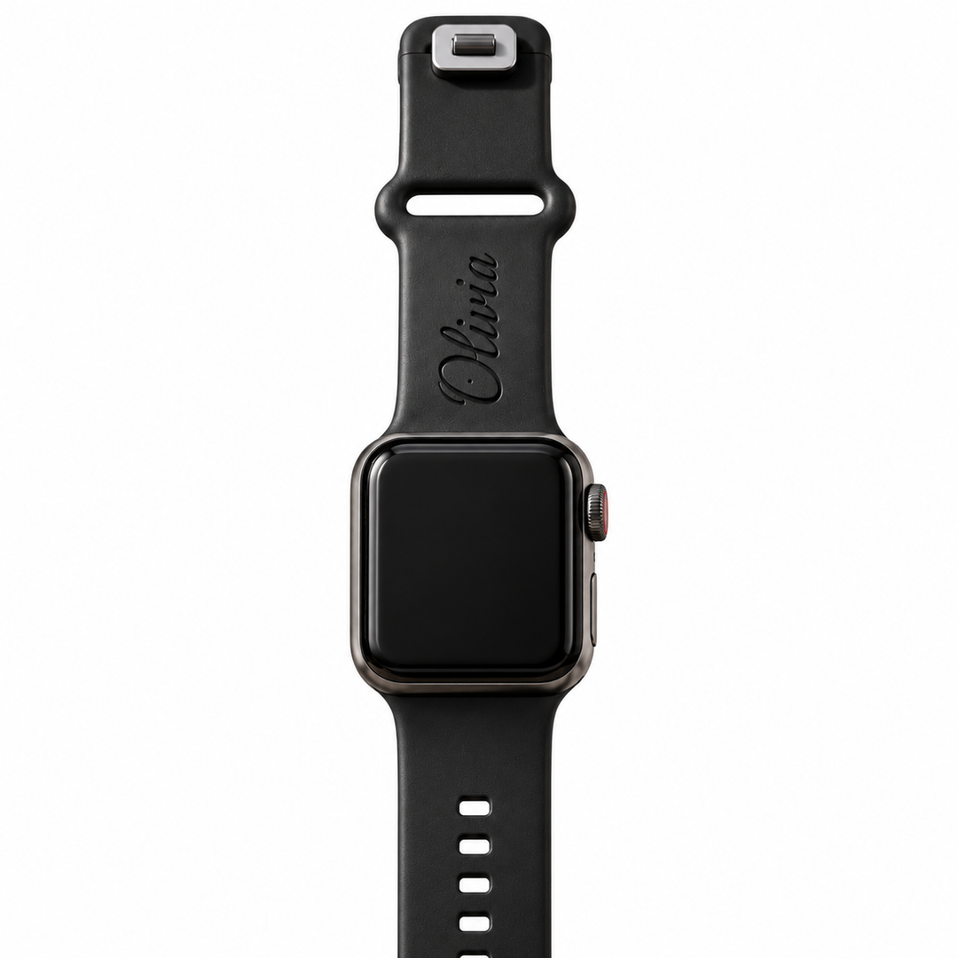 Matte black TPU Apple Watch band with Olivia name engraving, shown attached to a watch on a white background