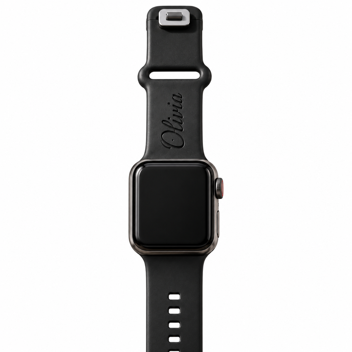 Matte black TPU Apple Watch band with Olivia name engraving, shown attached to a watch on a white background