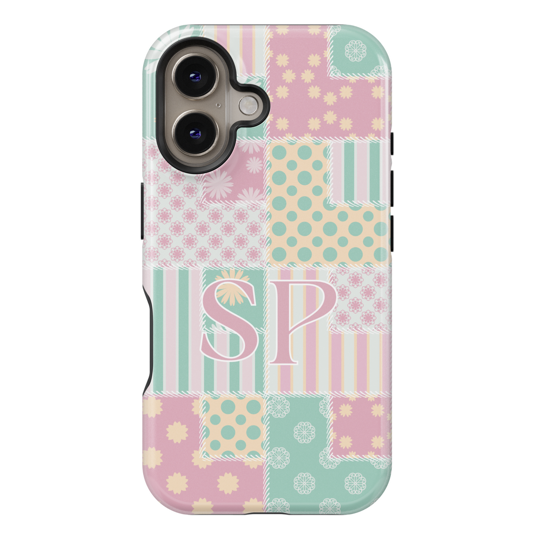 Personalized pastel patchwork iPhone case featuring soft vintage quilt patterns with custom initials. Aesthetic and cozy phone cover.