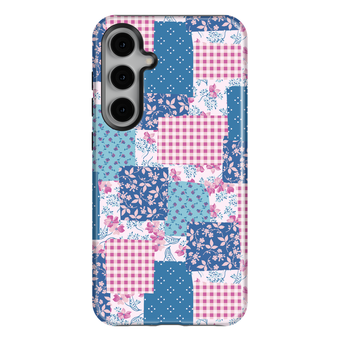 Charming patchwork Samsung Galaxy phone case featuring a vintage-inspired mix of floral, gingham, and polka dot patterns in blue and pink hues. Aesthetic protective cover for Samsung Galaxy S25 Ultra, S24 FE, S23, and more.