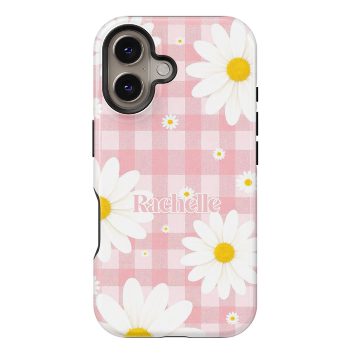 Custom name pink gingham iPhone case with white daisies. Cute floral aesthetic phone cover with a vintage picnic-inspired design.