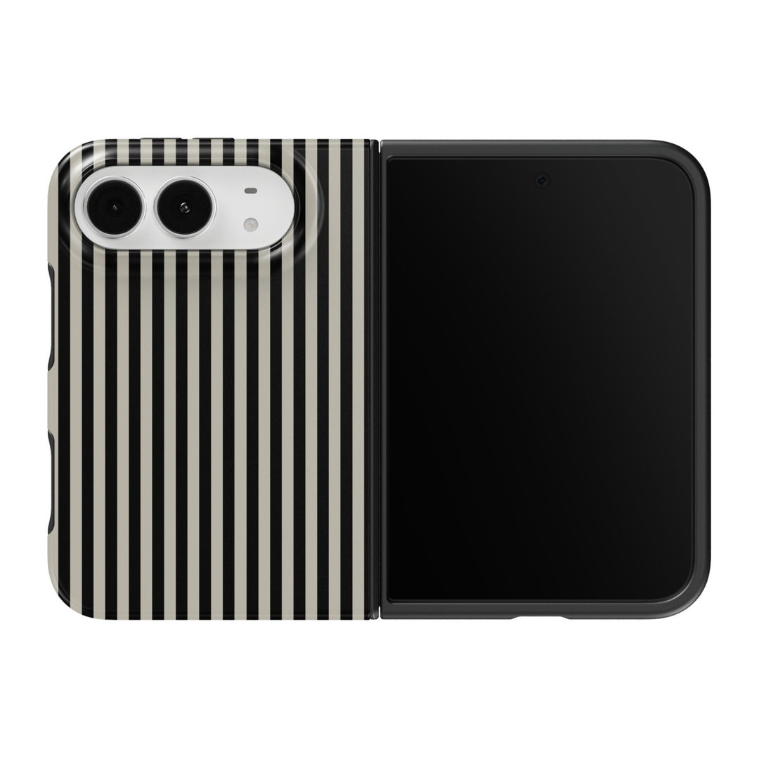 CASELIX Noir Pinstripe iPhone Duo Tough MagSafe folding phone case featuring elegant black and ivory-white vertical pinstripes in a classic evenly spaced repeating pattern. Chic black and white striped phone case for women with a glossy printed finish, minimalist monochrome aesthetic, Parisian-inspired fashion style, timeless preppy design, sophisticated geometric stripe artwork, and protective two-piece foldable construction.