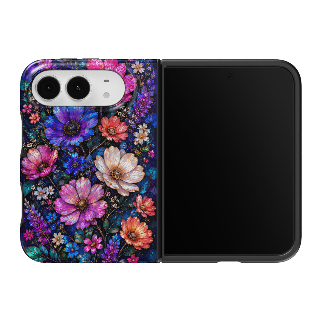 CASELIX Midnight Bloom iPhone 18 Duo Tough MagSafe folding phone case featuring vibrant purple, electric blue, hot pink, coral, and ivory flowers with intricate gold accents, jewel-toned botanical leaves, and a dark navy background. Colorful luxury floral phone case for women with a glossy printed finish and two-piece foldable design. Copy Alt Text