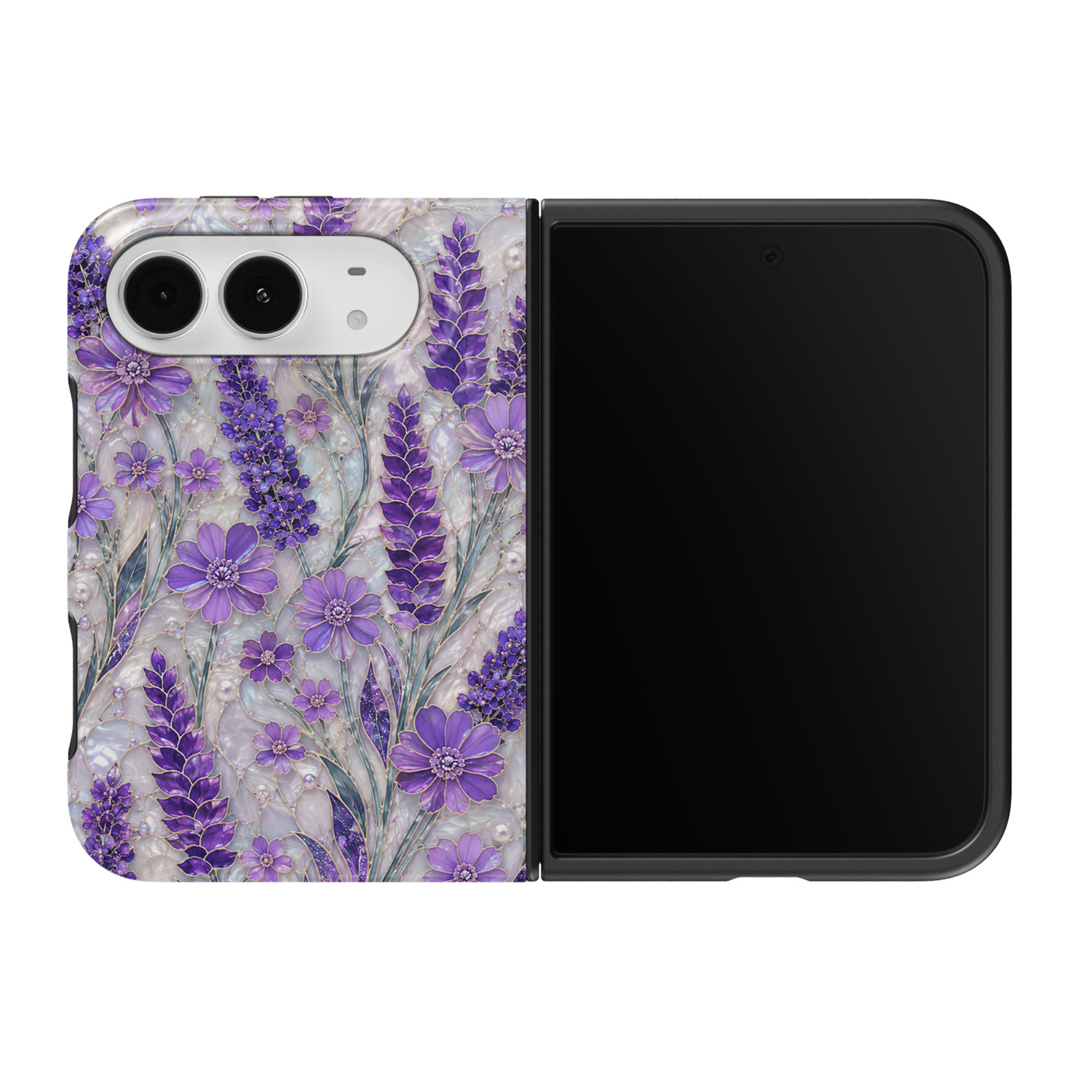CASELIX Lavender Whispers iPhone Duo Tough MagSafe folding phone case featuring an elegant purple floral stained-glass mosaic with lavender sprigs, violet wildflowers, lilac blossoms, sage-blue botanical leaves, delicate pearl accents, and intricate gold outlines over an iridescent mother-of-pearl-inspired background. Romantic lavender flower phone case for women with a glossy printed finish, dreamy cottagecore aesthetic, sophisticated botanical artwork, and protective two-piece foldable construction.
