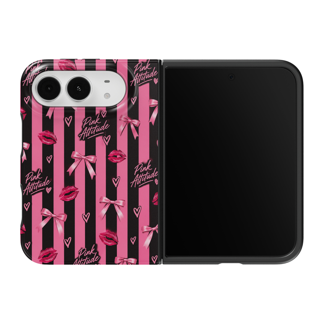 CASELIX Pink Attitude iPhone Duo Tough MagSafe folding phone case featuring bold black and hot pink vertical stripes decorated with glossy fuchsia lipstick kiss prints, pink satin ribbon bows, hand-drawn pink hearts, and repeating Pink Attitude script lettering. Trendy pink and black striped phone case for women with a glossy printed finish, flirty coquette aesthetic, Barbiecore-inspired fashion, glamorous Y2K style, girls&
