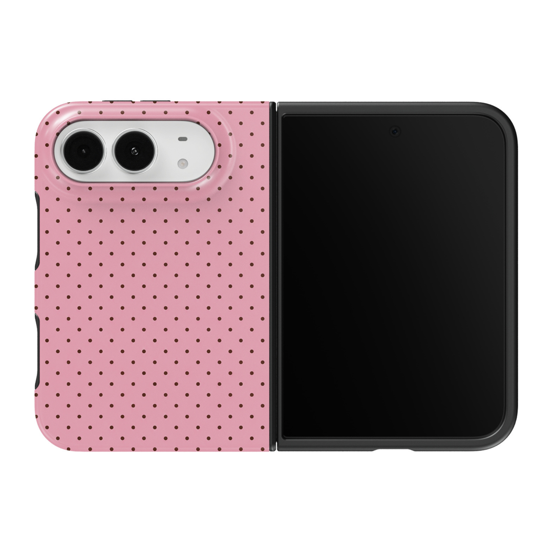 CASELIX Blush Polka iPhone Duo Tough MagSafe folding phone case featuring a soft blush-pink background decorated with tiny, evenly spaced chocolate-brown polka dots in a delicate repeating geometric pattern. Cute pink and brown dotted phone case for women with a glossy printed finish, minimalist feminine aesthetic, vintage-inspired micro polka dot design, preppy chic fashion style, soft coquette-inspired colors, and protective two-piece foldable construction.