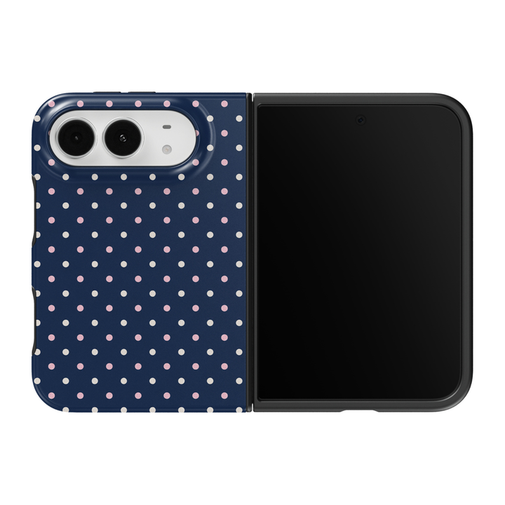 CASELIX Navy Polka iPhone Duo Tough MagSafe folding phone case featuring a deep midnight-navy blue background decorated with evenly spaced blush-pink and ivory-white polka dots in a classic repeating geometric pattern. Chic navy blue polka dot phone case for women with a glossy printed finish, feminine preppy aesthetic, timeless vintage-inspired dotted design, coastal chic fashion style, minimalist geometric artwork, and protective two-piece foldable construction.