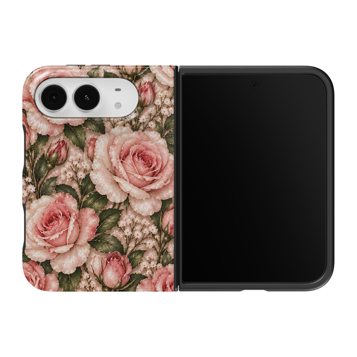 CASELIX Blushing Rose iPhone Duo Tough MagSafe folding phone case featuring lush blush-pink roses, dusty-rose flower buds, delicate ivory wildflowers, and deep sage-green botanical leaves with intricate gold-veined detailing and pearlescent stained-glass-inspired textures. Elegant pink rose floral phone case for women with a glossy printed finish, romantic cottagecore aesthetic, vintage botanical garden artwork, soft feminine color palette, and protective two-piece foldable construction.