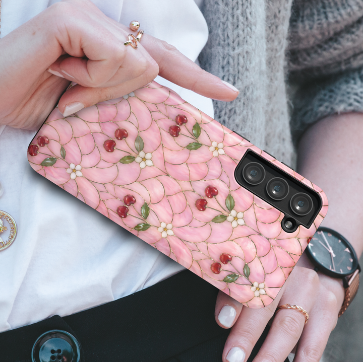 Girly pink cherry Samsung Galaxy S26 Ultra case with floral pattern and red cherries.