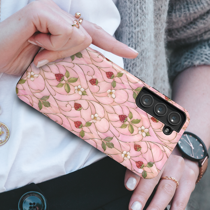 Girly pink strawberry Samsung Galaxy S26 Ultra case with floral vine pattern and cute berry accents.