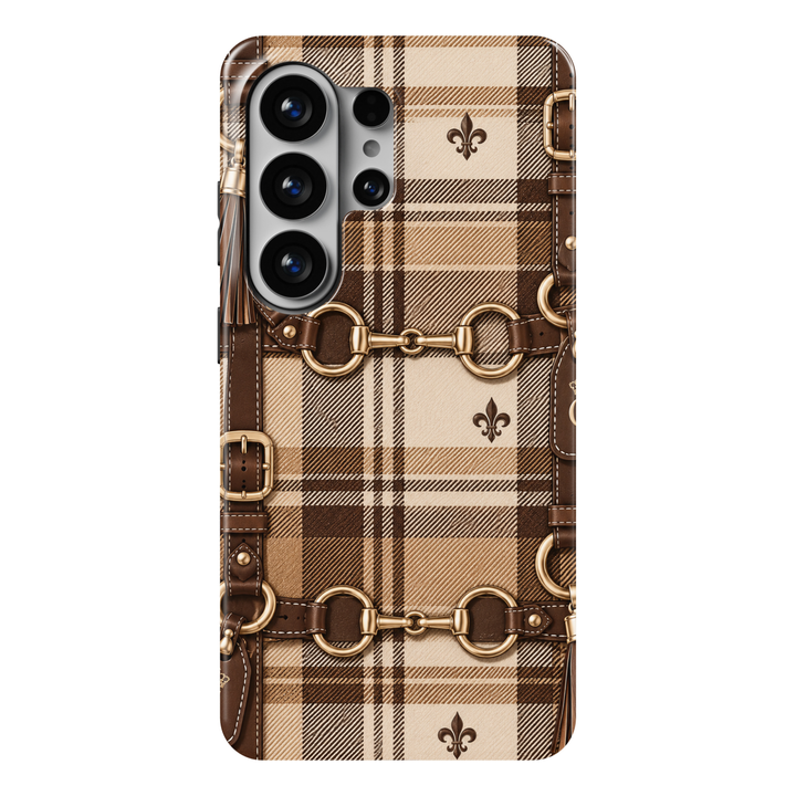 CASELIX Heritage Plaid Samsung Galaxy S26 Ultra Tough MagSafe protective phone case featuring a luxurious camel-beige, warm ivory, and rich chocolate-brown tartan plaid pattern inspired by classic equestrian fashion. Elegant dark brown leather-inspired straps with detailed stitching, polished gold horse-bit hardware, circular riding rings, and sophisticated buckle accents complement the timeless checked design. Delicate fleur-de-lis emblems, refined leather tassels, and layered plaid textures create a disti