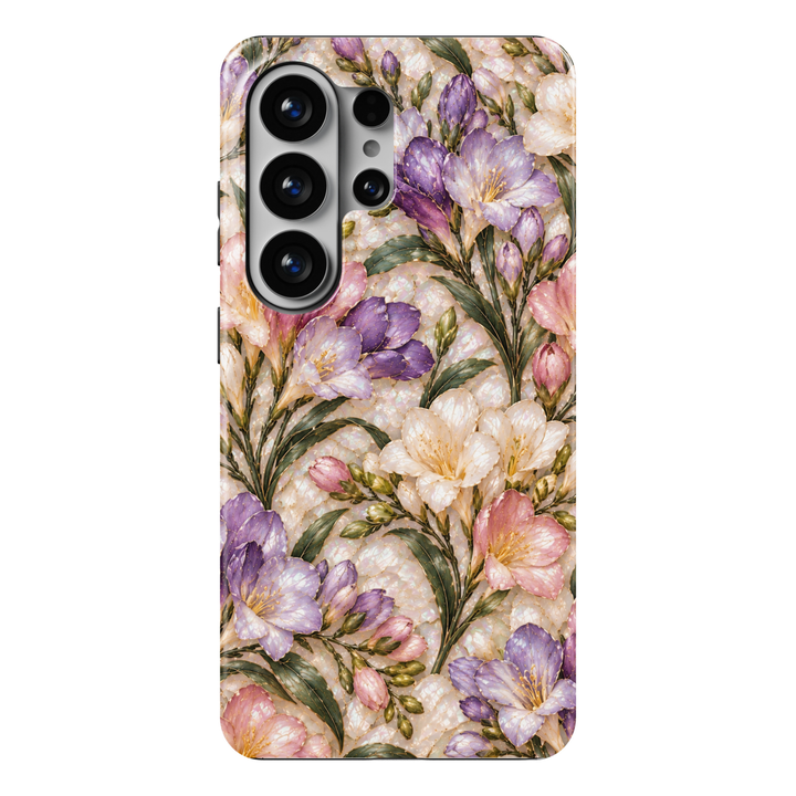 CASELIX Freesia Enchantment Samsung Galaxy S26 Ultra Tough MagSafe protective phone case featuring a luxurious pearlescent ivory and champagne-cream background adorned with elegant freesia blossoms in soft lavender-purple, blush pink, and creamy white. Delicate trumpet-shaped flowers display luminous mother-of-pearl-inspired petals, intricate champagne-gold outlines, golden stamens, and subtle shimmering accents. Graceful sage-green botanical leaves intertwine with slender golden stems, clusters of unopened
