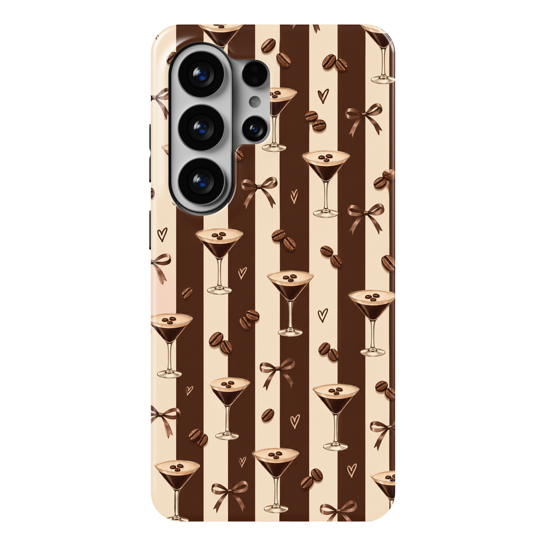 CASELIX Espresso Martini Samsung Galaxy S26 Ultra Tough MagSafe protective phone case featuring a chic chocolate-brown and creamy beige vertical striped background decorated with elegant espresso martini cocktail glasses, rich coffee beans, delicate mocha-brown satin ribbon bows, and minimalist hand-drawn hearts. Each sophisticated martini glass features a creamy espresso foam topping garnished with three coffee beans, creating a playful yet luxurious coffee-inspired aesthetic. The repeating pattern combine