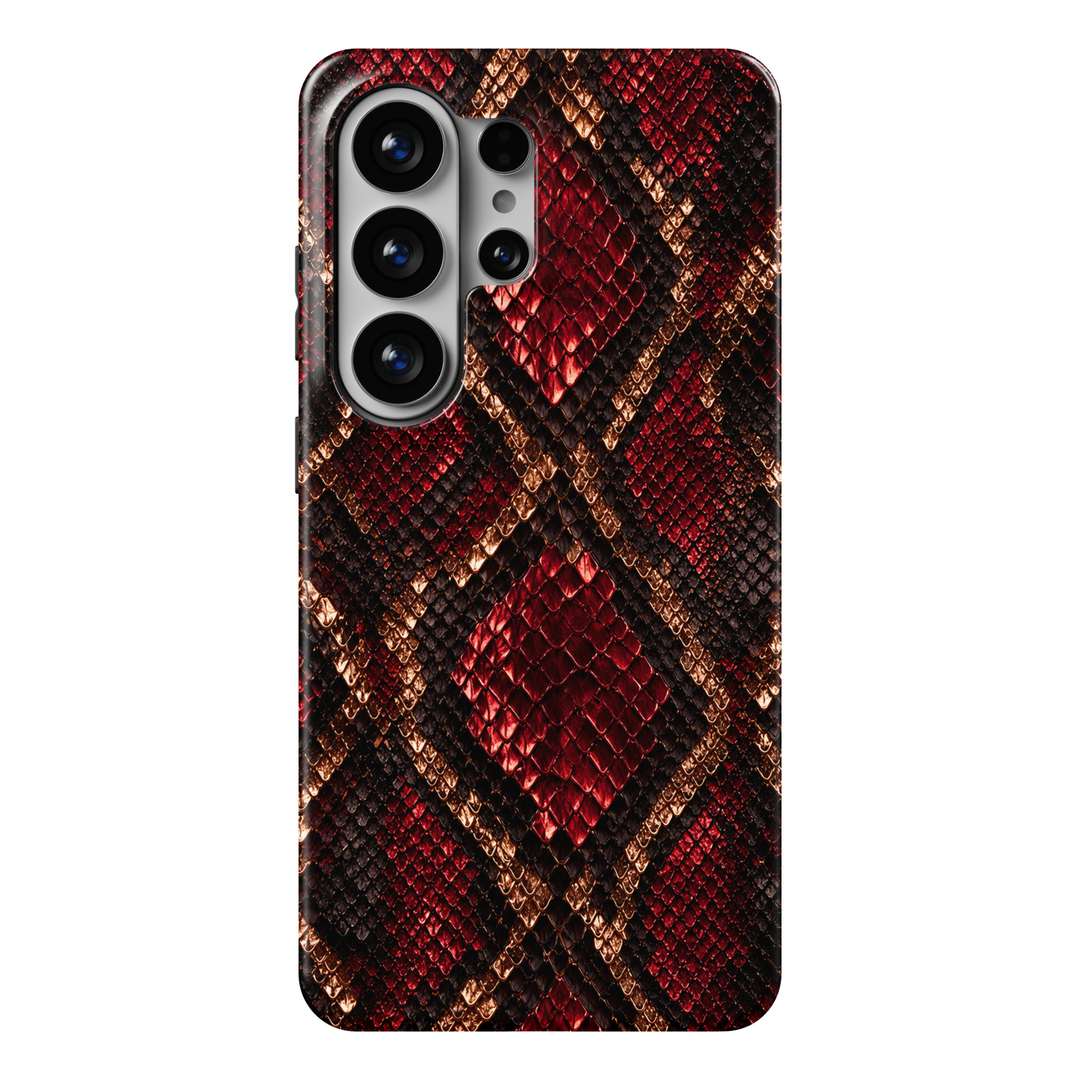 CASELIX Crimson Serpent Samsung Galaxy S26 Ultra Tough MagSafe protective phone case featuring a luxurious ruby-red, midnight-black, and metallic gold snakeskin-inspired pattern. The striking design showcases intricately detailed reptile scales arranged in bold diamond-shaped formations, combining rich crimson-red centers, deep black borders, and shimmering bronze-gold accents. Each scale features realistic textured detailing, glossy reflective highlights, and dimensional shading that creates the appearance