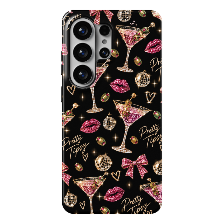 CASELIX Pretty Tipsy Samsung Galaxy S26 Ultra Tough MagSafe protective phone case featuring a glamorous jet-black background adorned with sparkling pink rhinestone-inspired martini glasses, emerald-green olives with ruby-red accents, dazzling fuchsia lipstick kiss prints, and shimmering gold disco balls. Luxurious pink jeweled ribbon bows, delicate golden hearts, twinkling starbursts, and elegant champagne-gold “Pretty Tipsy” handwritten lettering create a playful, sophisticated cocktail-party aesthetic. St