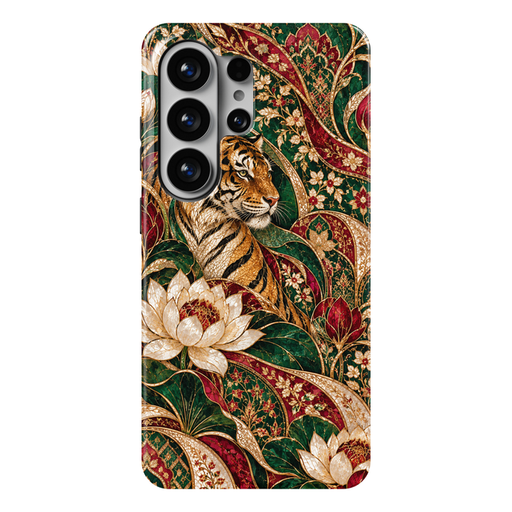 CASELIX Bengal Royalty Samsung Galaxy S26 Ultra Tough MagSafe protective phone case featuring a majestic Royal Bengal tiger with striking amber-gold fur, bold black stripes, and intricate golden detailing, surrounded by magnificent ivory-white lotus flowers, ruby-red lotus buds, and lush emerald-green botanical foliage. Elaborate Mughal-inspired paisley motifs, ornate golden filigree, delicate floral vines, and luxurious deep burgundy accents create a regal Indian heritage aesthetic reminiscent of royal Ben