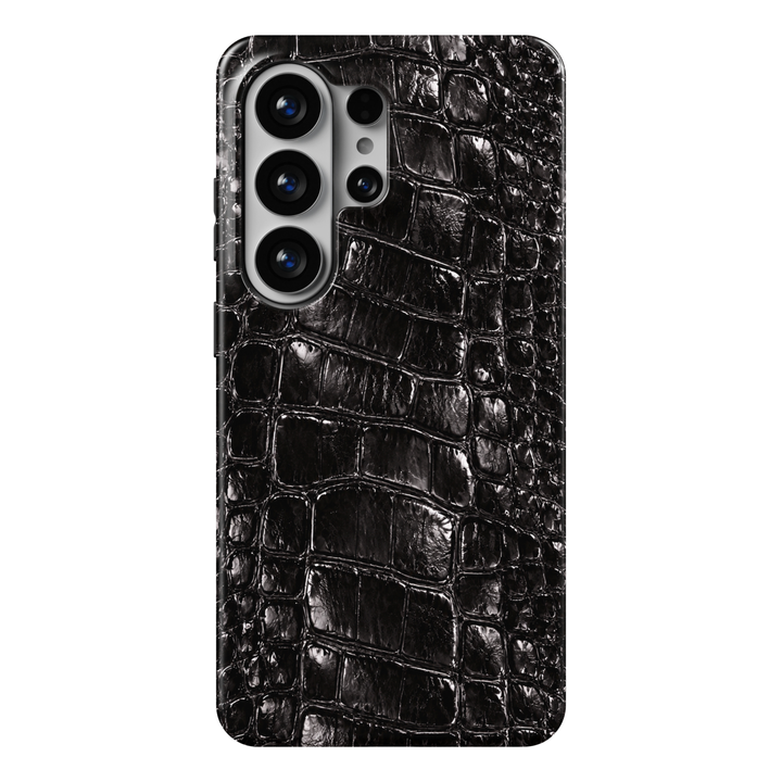 CASELIX Onyx Croc Samsung Galaxy S26 Ultra Tough MagSafe protective phone case featuring a luxurious jet-black crocodile leather-inspired pattern with a striking high-gloss finish. The sophisticated design showcases intricately detailed reptile scales in deep onyx black, charcoal, and glossy ebony tones, creating the realistic appearance of embossed exotic crocodile leather. Irregular rectangular scales feature fine natural-looking creases, raised-effect borders, intricate grain details, and brilliant refle