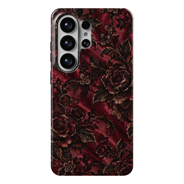 CASELIX Burgundy Gilded Rose Samsung Galaxy S26 Ultra Tough MagSafe protective phone case featuring an opulent deep burgundy and antique-gold floral pattern inspired by vintage baroque elegance. The luxurious design showcases intricately detailed dark crimson roses with shimmering bronze-gold outlines, delicate black lace-inspired textures, and beautifully layered petals. Elegant botanical vines intertwine with ornate metallic-looking leaves, miniature blossoms, and graceful scrolling flourishes across a ri